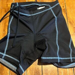Quest women’s padded cycling shorts. Like new. Black with blue stitching.